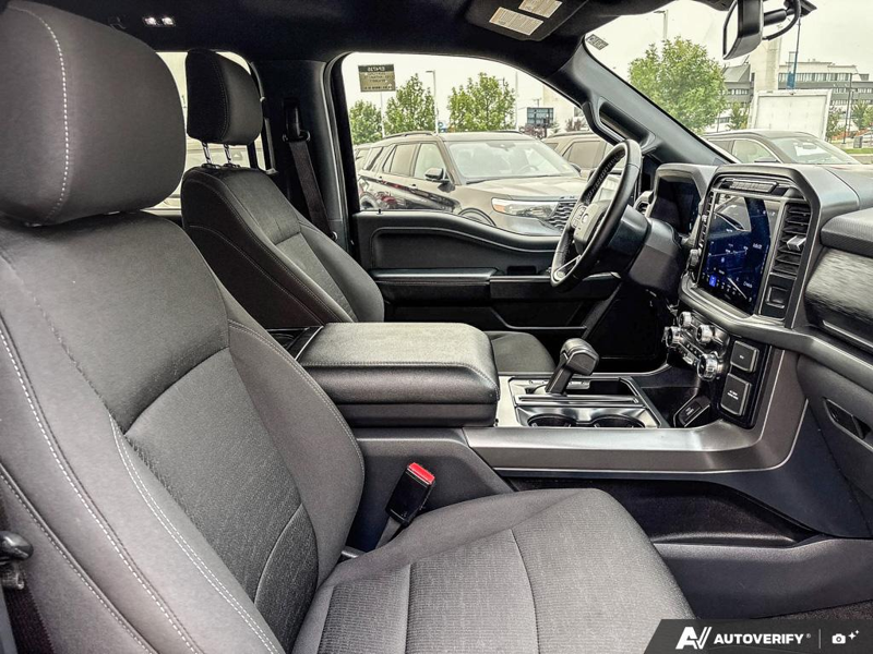USED 2024 Ford F-150 XLT - Antimatter Blue Metallic Exterior / BLACK, UNIQUE SPORT CLOTH 40/CONSOLE/40 FRONT-SEATS Interior - $53,910 - Stock #EP4735 - VIN 1FTFW3L85RFA38877 - Photo 22