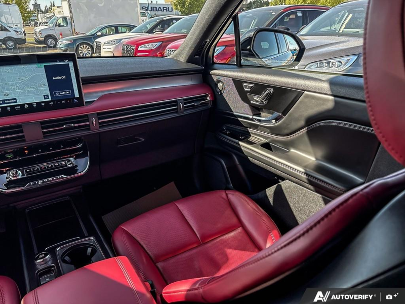 USED 2025 Lincoln Corsair Grand Touring - Crystal White Metallic Clearcoat Exterior / EBONY/ETERNAL RED, PREMIUM LEATHER-TRIMMED HEATED CAPTAIN'S CHAI Interior - $53,967 - Stock #EP4745 - VIN 5LMTJ5DZ8SUL12975 - Photo 25