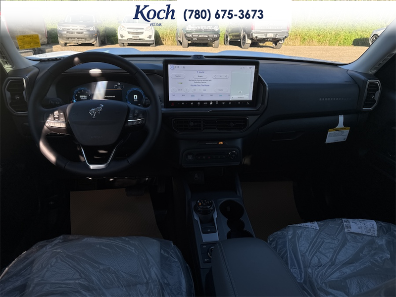 NEW 2026 Ford Bronco Sport Badlands - Oxford White Exterior / DARK SPACE GREY, LEATHER-TRIMMED FRONT SPORT CONTOUR BUCKET SEAT Interior - $50,430 - Stock #A26244 - VIN 3FMCR9DA7TRF11618 - Photo 19