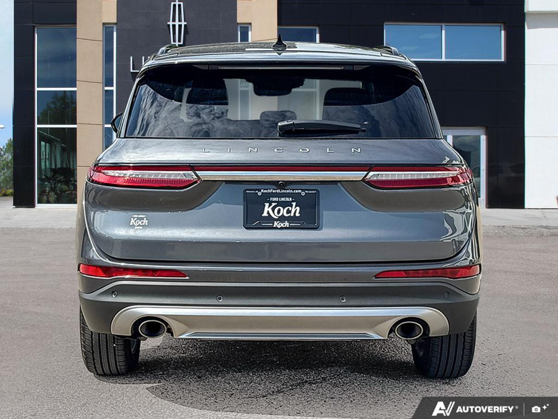 USED 2026 Lincoln Corsair Reserve - Asher Grey Metallic Clearcoat Exterior / EBONY, PREMIUM LEATHER-TRIMMED HEATED/VENTILATED CAPTAIN'S CHAIR Interior - $57,077 - Stock #EP4718 - VIN 5LMCJ2DA1TUL00077 - Photo 5
