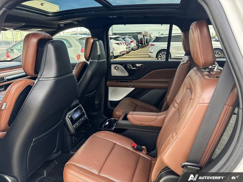 USED 2022 Lincoln Aviator Reserve - Pristine White Tri-coat Exterior / ROAST, PREMIUM LEATHER HEATED/VENTILATED CAPTAIN'S CHAIRS Interior - $48,942 - Stock #E60988A - VIN 5LM5J7XC3NGL16432 - Photo 23