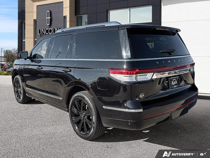 USED 2022 Lincoln Navigator Reserve - Infinite Black Metallic Exterior / BLACK ONYX/ROAST PREMIUM LEATHER Interior - $55,976 - Stock #E60212A - VIN 5LMJJ2LT3NEL09385 - Photo 4
