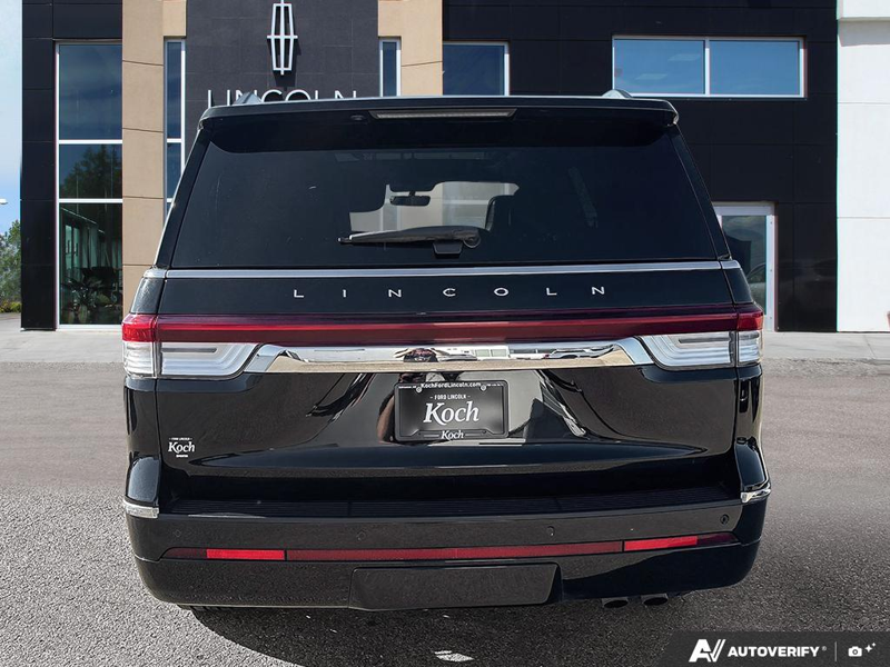 USED 2022 Lincoln Navigator Reserve - Infinite Black Metallic Exterior / BLACK ONYX/ROAST PREMIUM LEATHER Interior - $55,976 - Stock #E60212A - VIN 5LMJJ2LT3NEL09385 - Photo 5