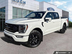 USED 2023 Ford F-150 Lariat - Star White Tri-coat Metallic Exterior - $62,997 - Stock #E50337A - VIN 1FTFW1E84PFB99560
