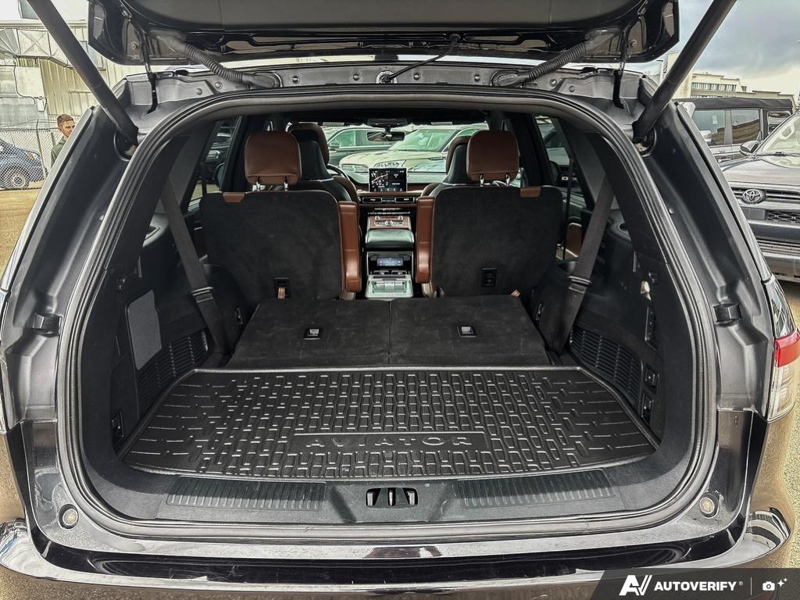 USED 2023 Lincoln Aviator Reserve - Infinite Black Metallic Exterior / ROAST LEATHER Interior - $59,997 - Stock #E51214A - VIN 5LM5J7XC7PGL12841 - Photo 12