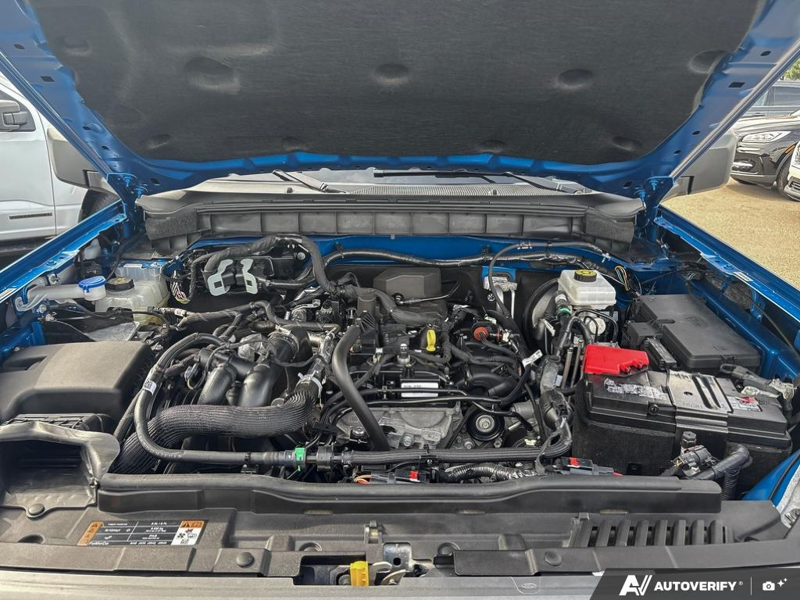 USED 2024 Ford Bronco Big Bend - Velocity Blue Metallic Exterior / SANDSTONE W/BLACK ONYX, MARINE GRADE VINYL BUCKET SEATS Interior - $48,211 - Stock #EP4762 - VIN 1FMDE7BH1RLA33224 - Photo 10