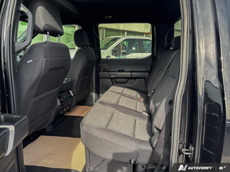 USED 2024 Ford F-150 XLT - Agate Black Metallic Exterior / BLACK, UNIQUE SPORT CLOTH 40/CONSOLE/40 FRONT-SEATS Interior - $57,950 - Stock #EP4783 - VIN 1FTFW3LDXRFB41256 - Photo 23