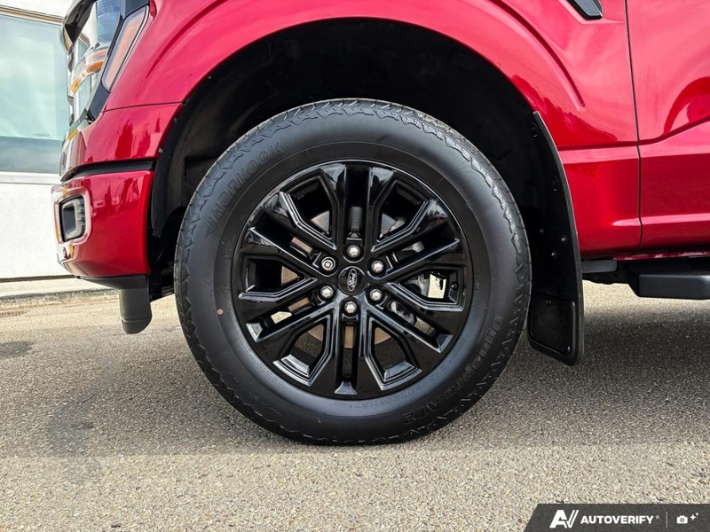 USED 2024 Ford F-150 XLT - Rapid Red Metallic Tinted Clearcoat Exterior / BLACK, UNIQUE SPORT CLOTH 40/CONSOLE/40 FRONT-SEATS Interior - $55,989 - Stock #EP4751 - VIN 1FTFW3L86RFA95007 - Photo 6
