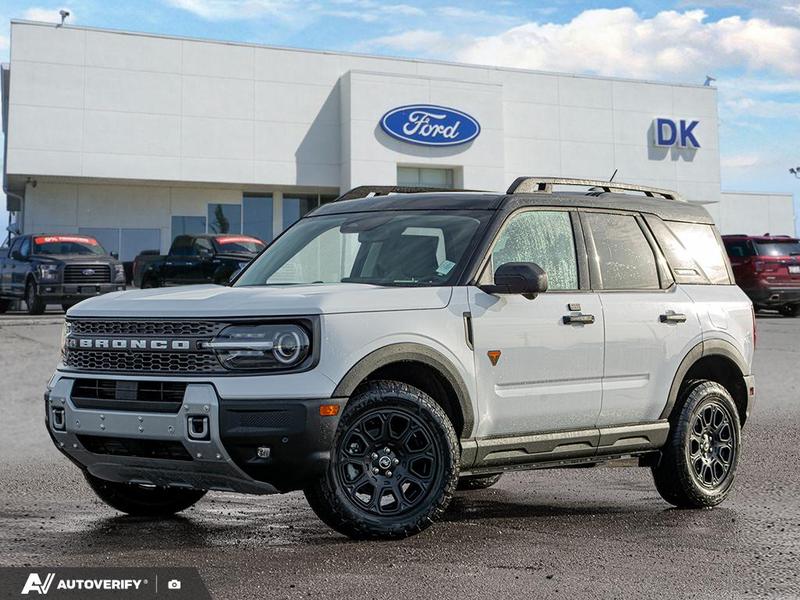 NEW 2025 Ford Bronco Sport Badlands - Oxford White Exterior / DARK SPACE GREY LEATHER Interior - $44,777 - Stock #D50943 - VIN 3FMCR9DA6SRF16470 - Photo 1