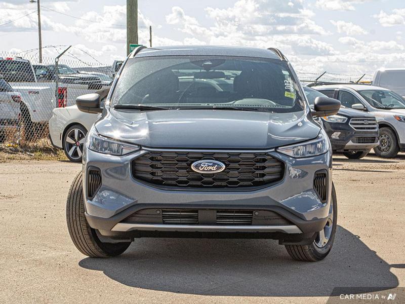 NEW 2025 Ford Escape ST-Line - Vapor Blue Exterior / EBONY VINYL/ RED STITCHING Interior - $36,943 - Stock #E50673 - VIN 1FMCU9MN6SUB09291 - Photo 2