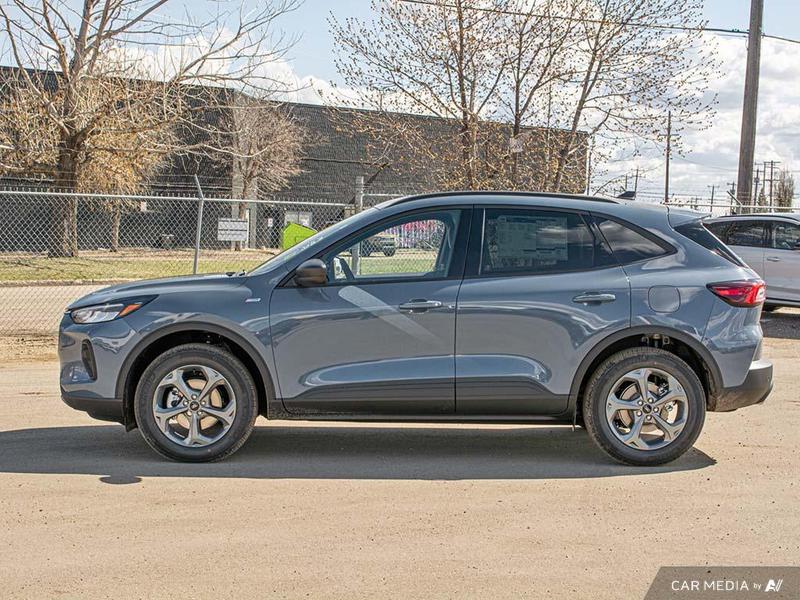 NEW 2025 Ford Escape ST-Line - Vapor Blue Exterior / EBONY VINYL/ RED STITCHING Interior - $36,943 - Stock #E50673 - VIN 1FMCU9MN6SUB09291 - Photo 3