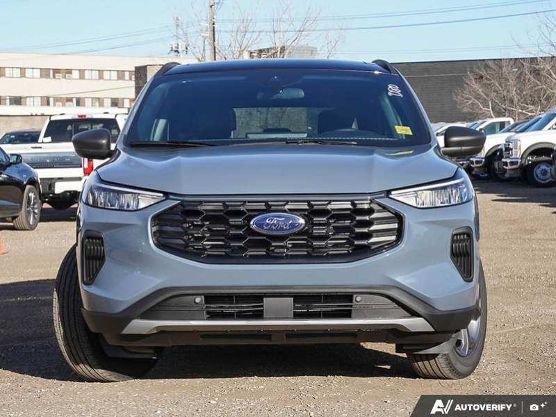 NEW 2025 Ford Escape ST-Line Hybrid - Vapor Blue Exterior / EBONY VINYL/ RED STITCHING Interior - $45,143 - Stock #E50102 - VIN 1FMCU9MZXSUA13070 - Photo 2
