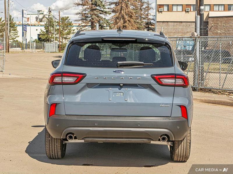 NEW 2025 Ford Escape ST-Line - Vapor Blue Exterior / EBONY VINYL/ RED STITCHING Interior - $36,943 - Stock #E50673 - VIN 1FMCU9MN6SUB09291 - Photo 5