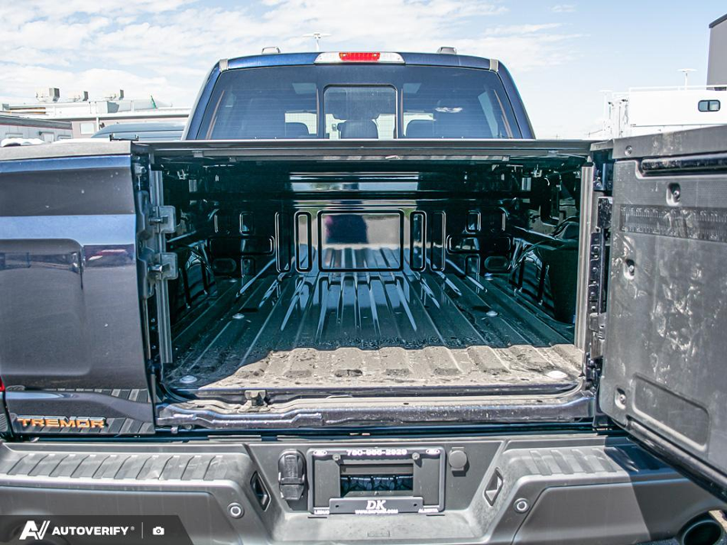 NEW 2025 Ford F-150 Tremor - Antimatter Blue Metallic Exterior / BLACK TREMOR LEATHER Interior - $92,201 - Stock #D51014 - VIN 1FTFW4L52SFC33028 - Photo 11