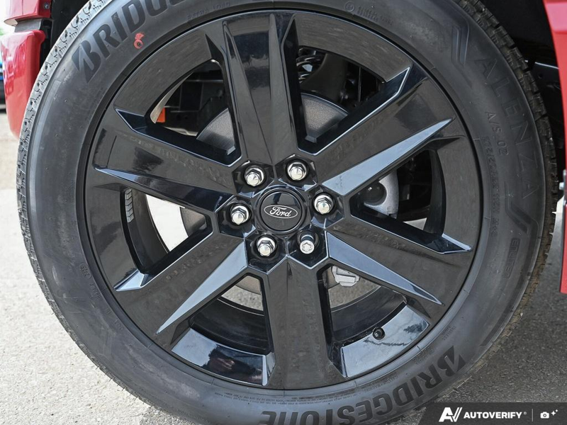 NEW 2025 Ford F-150 LOBO - Rapid Red Tri-coat Metallic Exterior / BLACK STX CLOTH Interior - $63,899 - Stock #E51376 - VIN 1FTEW2L59SFC08241 - Photo 6