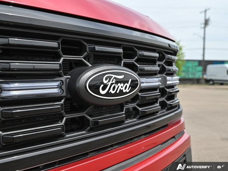 NEW 2025 Ford F-150 LOBO - Rapid Red Tri-coat Metallic Exterior / BLACK STX CLOTH Interior - $63,899 - Stock #E51376 - VIN 1FTEW2L59SFC08241 - Photo 9