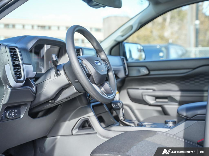 NEW 2025 Ford Ranger XL - Carbonized Grey Metallic Exterior / EBONY PREMIUM CLOTH Interior - $44,909 - Stock #E51267 - VIN 1FTER4PH3SLE51617 - Photo 13