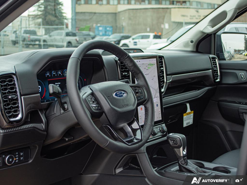 NEW 2025 Ford Ranger Lariat - Shadow Black Exterior / EBONY LEATHER-TRIMMED Interior - $53,899 - Stock #E51335 - VIN 1FTER4KH9SLE62161 - Photo 13