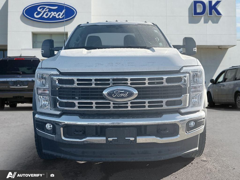 NEW 2025 Ford Super Duty F-600 DRW XLT - Oxford White Exterior / MEDIUM DARK SLATE CLOTH Interior - $114,777 - Stock #D50735 - VIN 1FDFF6LT8SDA15127 - Photo 2