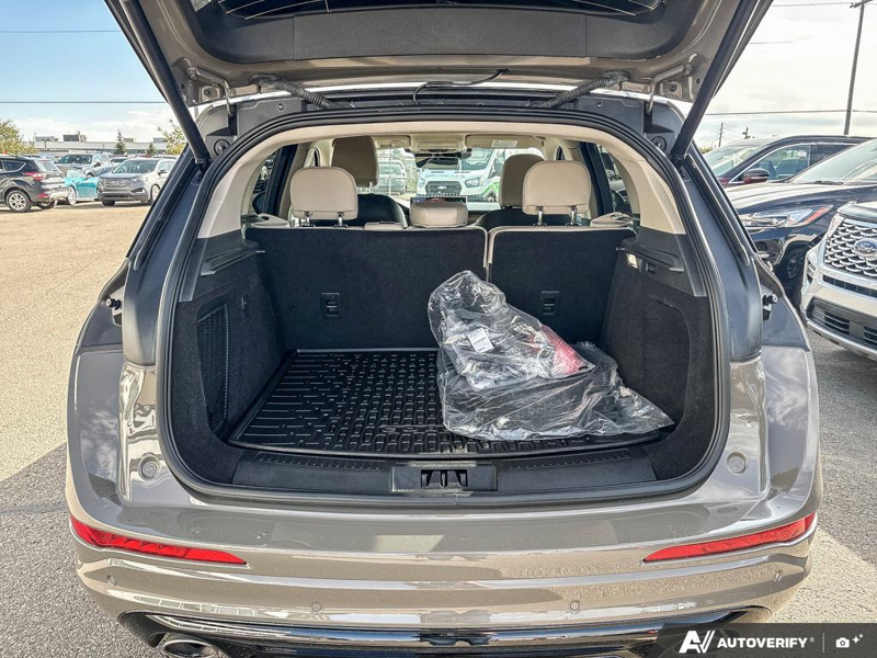 USED 2025 Lincoln Corsair Grand Touring - Harbor Gray Met Cc Exterior / LIGHT SMOKED TRUFFLE, PREMIUM LEATHER-TRIMMED HEATED CAPTAIN'S C Interior - $55,997 - Stock #EP4776 - VIN 5LMTJ5DZ9SUL02410 - Photo 12