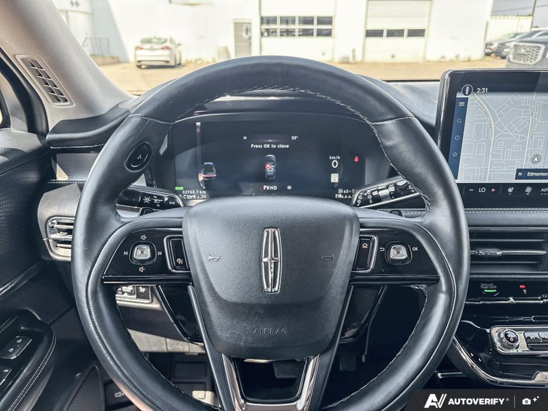 USED 2025 Lincoln Corsair Grand Touring - Infinite Black Metallic Clearcoat Exterior / EBONY, PREMIUM LEATHER-TRIMMED HEATED CAPTAIN'S CHAIRS Interior - $50,908 - Stock #EP4719 - VIN 5LMTJ5DZ1SUL12154 - Photo 14