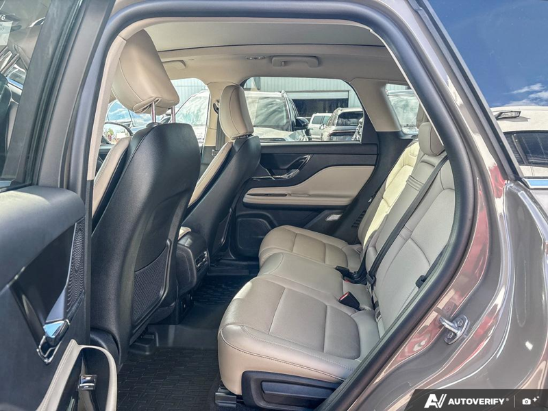 USED 2025 Lincoln Corsair Grand Touring - Harbor Gray Met Cc Exterior / LIGHT SMOKED TRUFFLE, PREMIUM LEATHER-TRIMMED HEATED CAPTAIN'S C Interior - $55,997 - Stock #EP4776 - VIN 5LMTJ5DZ9SUL02410 - Photo 23