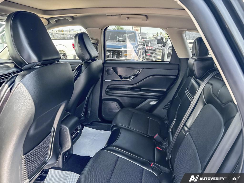 USED 2025 Lincoln Corsair Grand Touring - Infinite Black Metallic Clearcoat Exterior / EBONY, PREMIUM LEATHER-TRIMMED HEATED CAPTAIN'S CHAIRS Interior - $50,908 - Stock #EP4719 - VIN 5LMTJ5DZ1SUL12154 - Photo 23