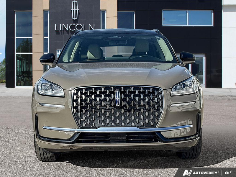 USED 2025 Lincoln Corsair Grand Touring - Harbor Gray Met Cc Exterior / LIGHT SMOKED TRUFFLE, PREMIUM LEATHER-TRIMMED HEATED CAPTAIN'S C Interior - $55,997 - Stock #EP4776 - VIN 5LMTJ5DZ9SUL02410 - Photo 2