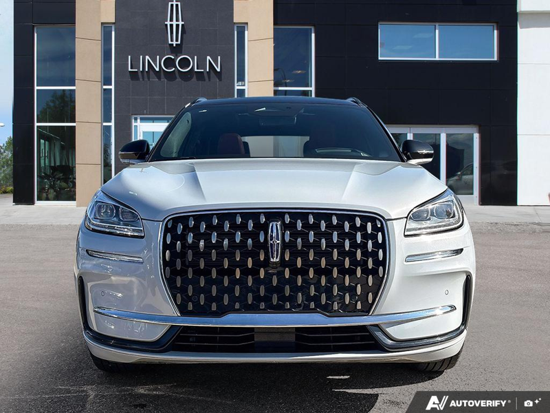 USED 2025 Lincoln Corsair Grand Touring - Crystal White Metallic Clearcoat Exterior / EBONY/ETERNAL RED, PREMIUM LEATHER-TRIMMED HEATED CAPTAIN'S CHAI Interior - $53,967 - Stock #EP4745 - VIN 5LMTJ5DZ8SUL12975 - Photo 2