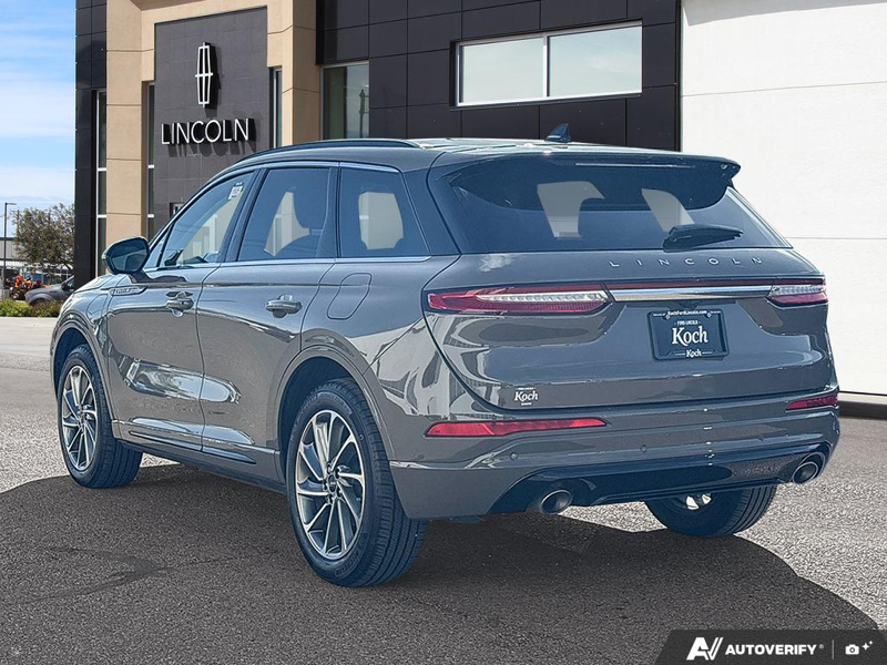 USED 2025 Lincoln Corsair Grand Touring - Harbor Gray Met Cc Exterior / LIGHT SMOKED TRUFFLE, PREMIUM LEATHER-TRIMMED HEATED CAPTAIN'S C Interior - $55,997 - Stock #EP4776 - VIN 5LMTJ5DZ9SUL02410 - Photo 4