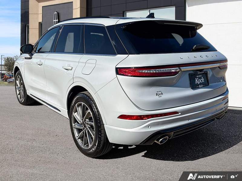 USED 2025 Lincoln Corsair Grand Touring - Crystal White Metallic Clearcoat Exterior / EBONY/ETERNAL RED, PREMIUM LEATHER-TRIMMED HEATED CAPTAIN'S CHAI Interior - $53,967 - Stock #EP4745 - VIN 5LMTJ5DZ8SUL12975 - Photo 4