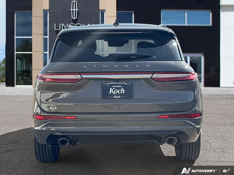USED 2025 Lincoln Corsair Grand Touring - Harbor Gray Met Cc Exterior / LIGHT SMOKED TRUFFLE, PREMIUM LEATHER-TRIMMED HEATED CAPTAIN'S C Interior - $55,997 - Stock #EP4776 - VIN 5LMTJ5DZ9SUL02410 - Photo 5