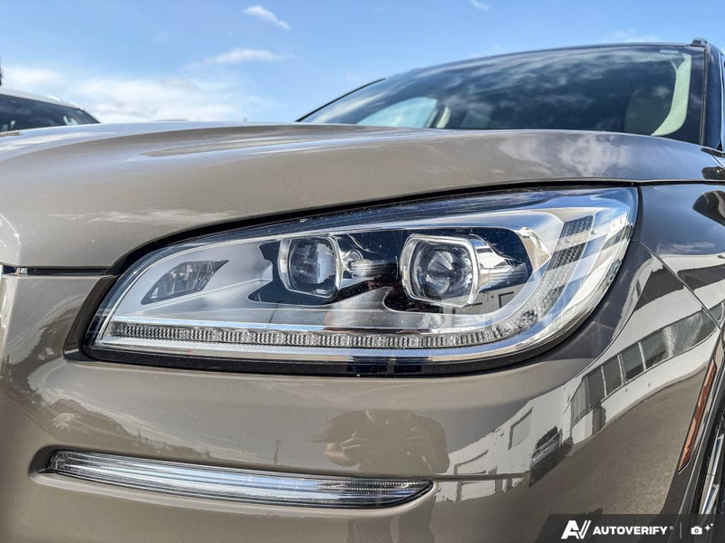 USED 2025 Lincoln Corsair Grand Touring - Harbor Gray Met Cc Exterior / LIGHT SMOKED TRUFFLE, PREMIUM LEATHER-TRIMMED HEATED CAPTAIN'S C Interior - $55,997 - Stock #EP4776 - VIN 5LMTJ5DZ9SUL02410 - Photo 8
