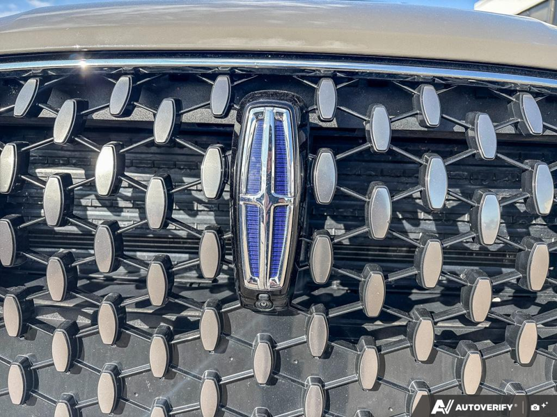 USED 2025 Lincoln Corsair Grand Touring - Harbor Gray Met Cc Exterior / LIGHT SMOKED TRUFFLE, PREMIUM LEATHER-TRIMMED HEATED CAPTAIN'S C Interior - $55,997 - Stock #EP4776 - VIN 5LMTJ5DZ9SUL02410 - Photo 9
