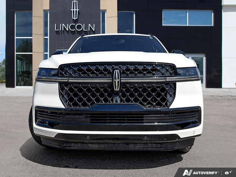 USED 2025 Lincoln Navigator Reserve - Pristine White Metallic Tri-coat Exterior / BLACK ONYX LEATHER Interior - $108,989 - Stock #E60801A - VIN 5LMJJ2LG6SEL00856 - Photo 2