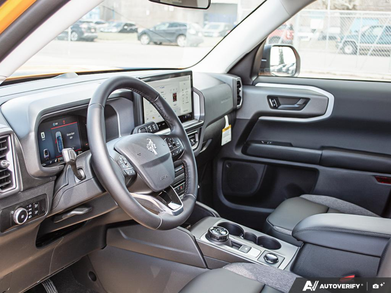 NEW 2026 Ford Bronco Sport Big Bend - Orange Fury Metallic Tri-coat Exterior / EBONY, PREMIUM TRIMMED HTD FR SPORT CONTOUR BUCKET SEATS Interior - $40,849 - Stock #E60242 - VIN 3FMCR9BN6TRE10964 - Photo 13
