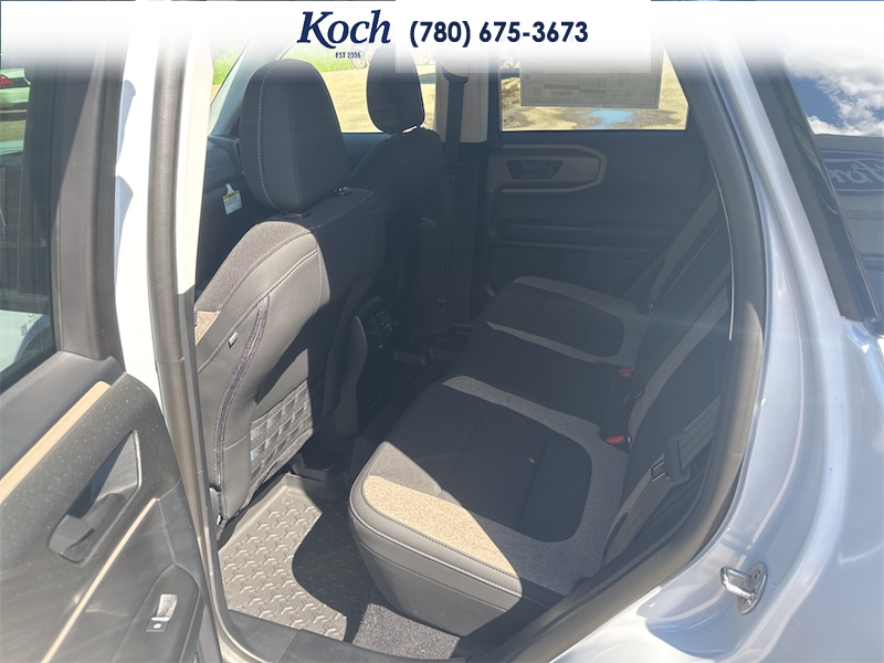 NEW 2026 Ford Bronco Sport Big Bend - Space White Metallic Exterior / MEDIUM LT SMOKED TRUFFLE, CLOTH HEATED FRONT BUCKET SEATS Interior - $39,915 - Stock #A26206 - VIN 3FMCR9BN3TRE70071 - Photo 18