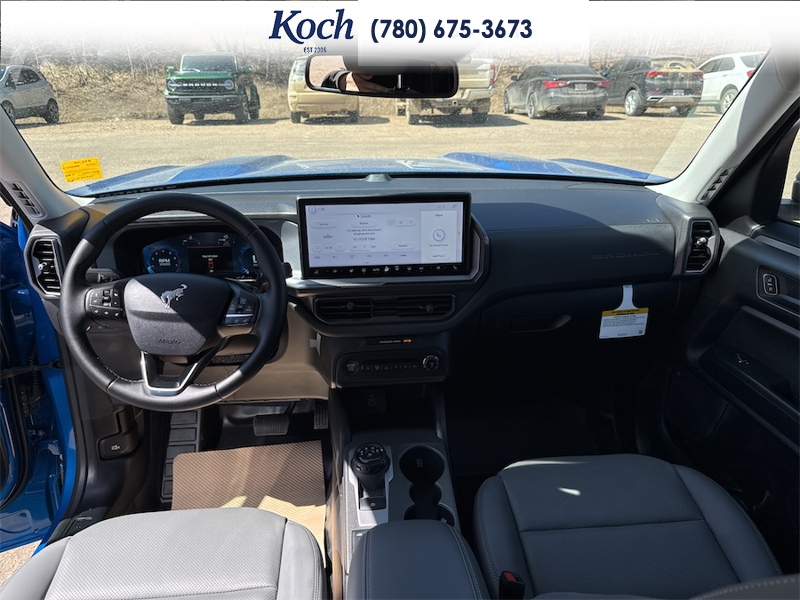 NEW 2026 Ford Bronco Sport Badlands - Velocity Blue Metallic Exterior / DARK SPACE GREY LEATHER Interior - $48,440 - Stock #A26156 - VIN 3FMCR9DA6TRE49757 - Photo 19