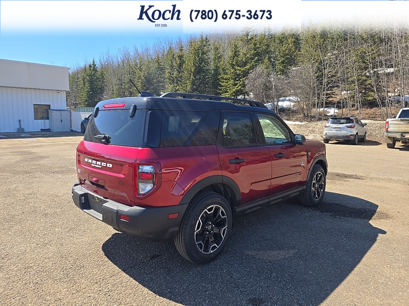 NEW 2026 Ford Bronco Sport Outer Banks - Ruby Red Tri-coat Metallic Exterior / EBONY BROWN VINYL Interior - $43,040 - Stock #A26145 - VIN 3FMCR9CN2TRE36671 - Photo 2