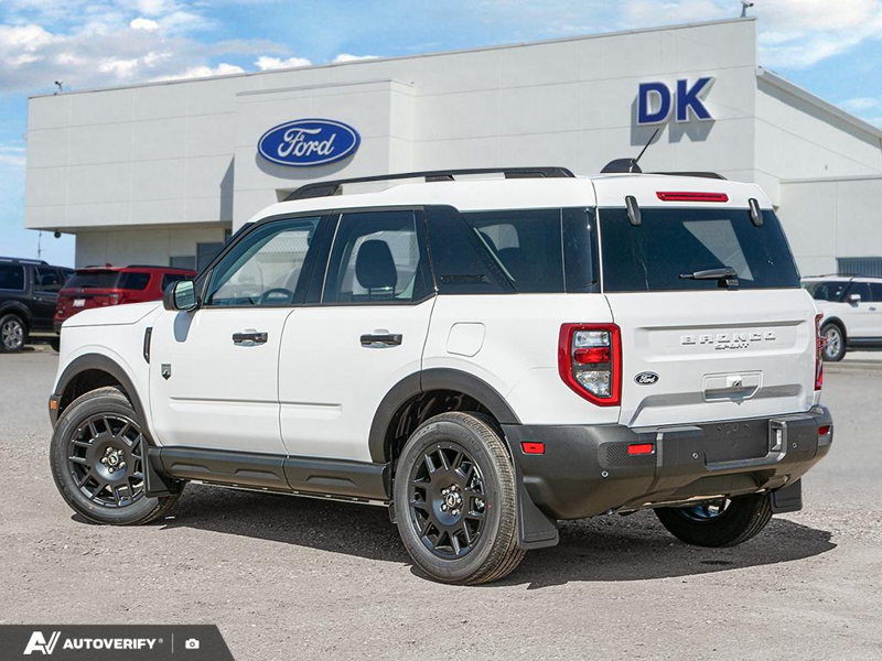 NEW 2026 Ford Bronco Sport Big Bend - Oxford White Exterior / MEDIUM LT SMOKED TRUFFLE, CLOTH HEATED FRONT BUCKET SEATS Interior - $38,933 - Stock #D60735 - VIN 3FMCR9BN2TRE95995 - Photo 4
