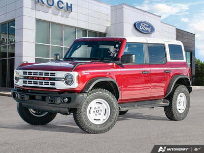 NEW 2026 Ford Bronco Heritage Edition - Ruby Red Tri-coat Metallic Exterior - $76,259 - Stock #E60227 - VIN 1FMEE4DP9TLA42011