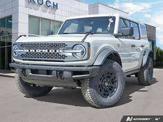 NEW 2026 Ford Bronco Badlands - Desert Sand Exterior - $89,919 - Stock #E60539 - VIN 1FMEE9BP0TLA77083
