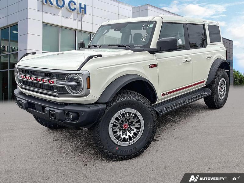 NEW 2026 Ford Bronco Outer Banks 60th Anniversary Edition - Wimbledon White Exterior / BLACK ONYX-LEATHER/VINYL Interior - $83,879 - Stock #E60681 - VIN 1FMEE8BH0TLA92542 - Photo 1