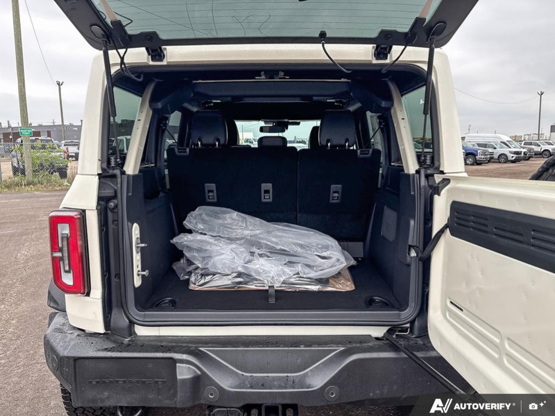 NEW 2026 Ford Bronco Outer Banks 60th Anniversary Edition - Wimbledon White Exterior / BLACK ONYX-LEATHER/VINYL Interior - $75,557 - Stock #E60681 - VIN 1FMEE8BH0TLA92542 - Photo 12