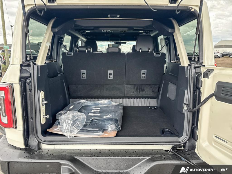 NEW 2026 Ford Bronco Outer Banks 60th Anniversary Edition - Wimbledon White Exterior / BLACK ONYX-LEATHER/VINYL Interior - $88,624 - Stock #E60716 - VIN 1FMEE8BPXTLB02498 - Photo 12