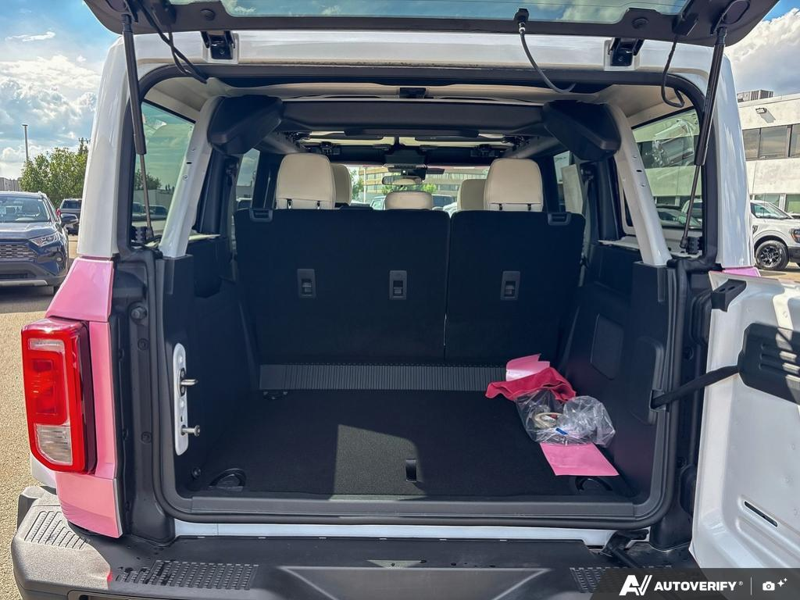 NEW 2026 Ford Bronco Heritage "Pink Pony" Edition - Oxford White Exterior / BLACK ONYX-PLAID CLOTH NAVY PIER SEATS Interior - $95,859 - Stock #E60452 - VIN 1FMEE4DP1TLA71633 - Photo 12