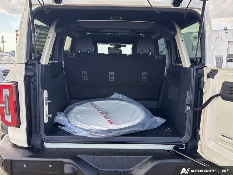 NEW 2026 Ford Bronco Outer Banks - Wimbledon White Exterior / BLACK ONYX-LEATHER/VINYL Interior - $87,459 - Stock #E60989 - VIN 1FMEE8BP8TLB22474 - Photo 12