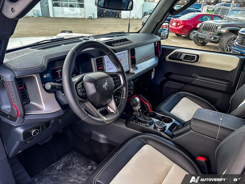 NEW 2026 Ford Bronco Outer Banks - Wimbledon White Exterior / BLACK ONYX-LEATHER/VINYL Interior - $87,459 - Stock #E60989 - VIN 1FMEE8BP8TLB22474 - Photo 13