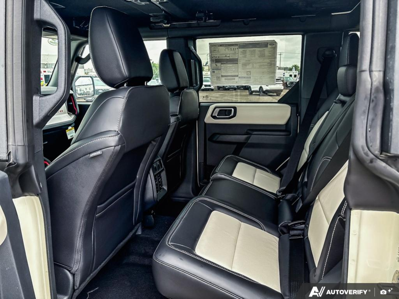 NEW 2026 Ford Bronco Outer Banks 60th Anniversary Edition - Wimbledon White Exterior / BLACK ONYX-LEATHER/VINYL Interior - $75,557 - Stock #E60681 - VIN 1FMEE8BH0TLA92542 - Photo 23