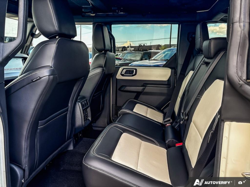 NEW 2026 Ford Bronco Outer Banks - Wimbledon White Exterior / BLACK ONYX-LEATHER/VINYL Interior - $87,459 - Stock #E60989 - VIN 1FMEE8BP8TLB22474 - Photo 23